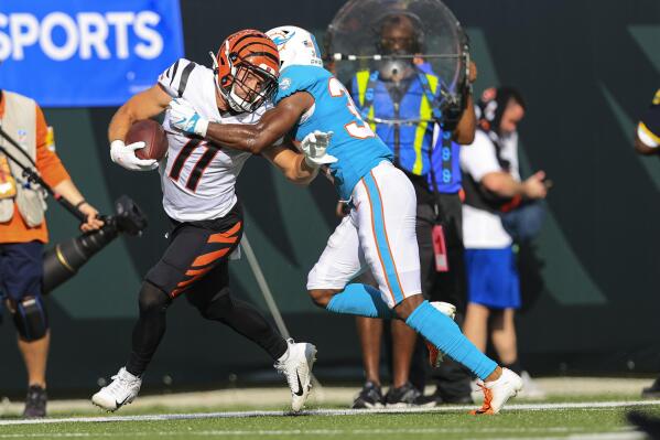 Burrow returns for Bengals as Dolphins rally for win