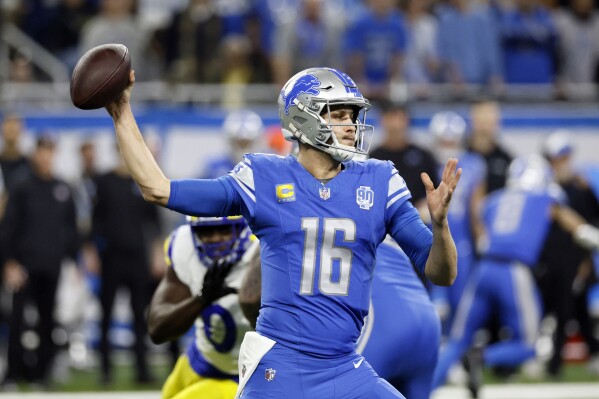 Jared Goff leads Lions to first playoff win in 32 years | AP News