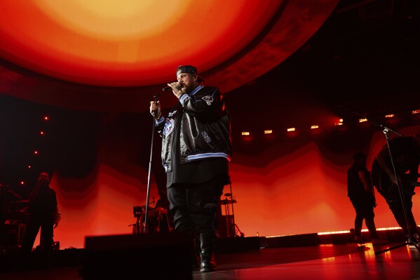 This image provided by shows Jelly Roll performing at Amazon Music Live in Los Angeles on Oct. 3, 2024. (Jesse Lirola via AP)