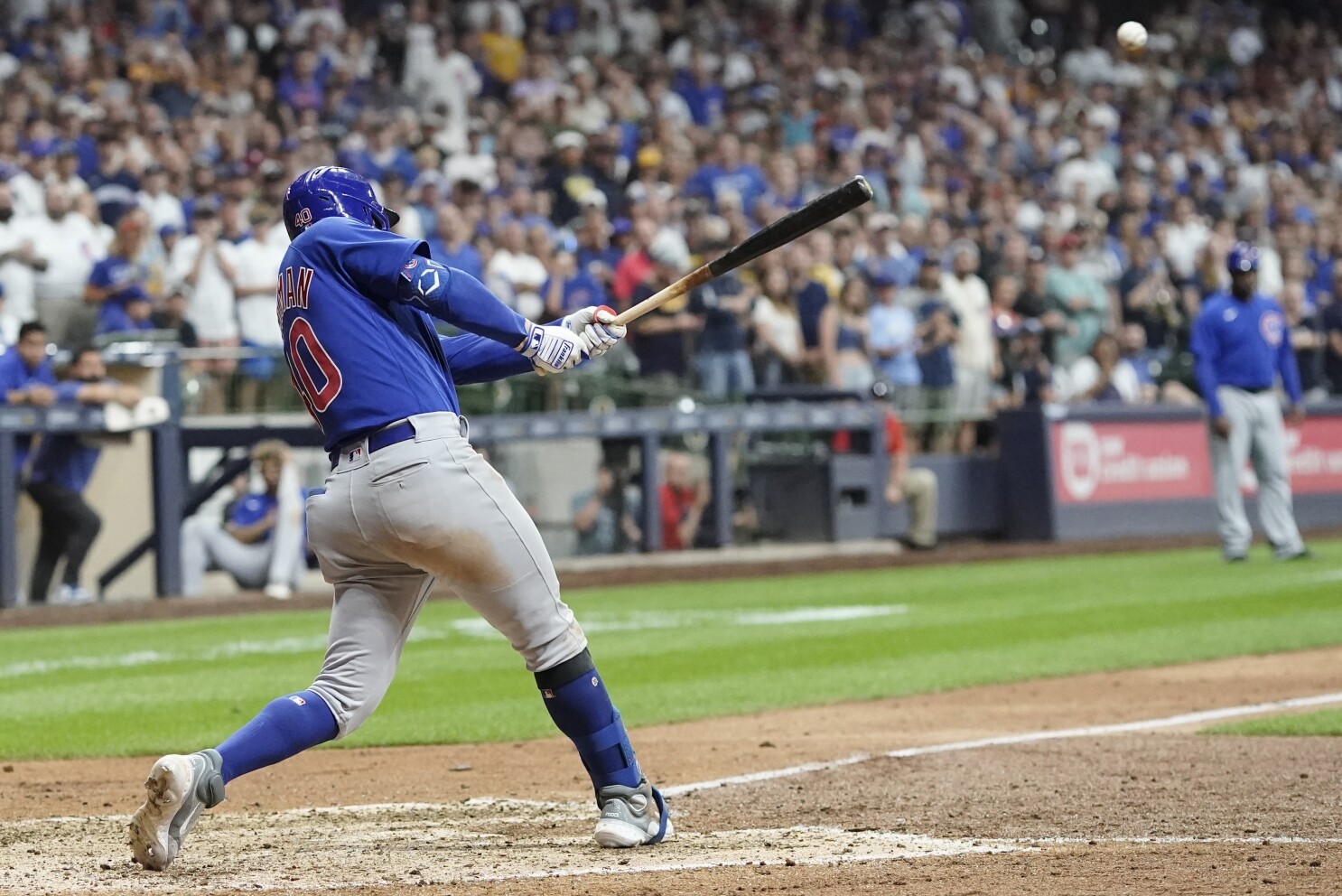 Milwaukee Brewers first baseman Rowdy Tellez, right, reaches out to catch a  throw to first base to get Arizona Diamondbacks' Alek Thomas (5) out during  the sixth inning of a baseball game