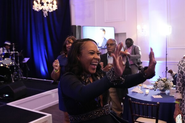 Fulton County District Attorney Fani Willis celebrates with supporters after winning the Democratic primary on Tuesday, May 21, 2024, in Buckhead, Ga. (AP Photo/Brynn Anderson)