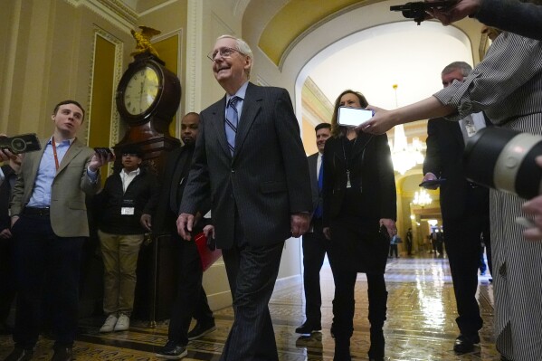 Senate Minority Leader Mitch McConnell of Ky., walks to the Senate to speak on the Senate floor, Wednesday, Feb. 28, 2024 at the Capitol in Washington. McConnell says he'll step down as Senate Republican leader in November. The 82-year-old Kentucky lawmaker is the longest-serving Senate leader in history. He's maintained his power in the face of dramatic changes in the Republican Party. He's set to make the announcement Wednesday McConnell on the Senate floor.(AP Photo/Mark Schiefelbein)
