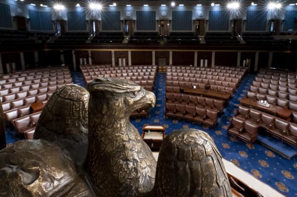 FILE - The chamber of the House of Representatives is seen at the Capitol in Washington, Feb. 28, 2022. President Joe Biden plans to deliver his second State of the Union address on Feb. 7. That was the date proposed by House Speaker Kevin McCarthy in his invitation to Biden on Friday to address a joint session of Congress. It will be Biden’s first address to a divided Congress after Republicans took control of the House this month. (AP Photo/J. Scott Applewhite, File)