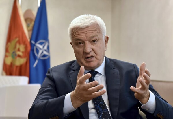 Montenegro's Prime Minister Dusko Markovic speaks during an interview with The Associated Press in Montenegro's capital Podgorica, Friday, Oct. 18, 2019. Markovic said that once Britain's Brexit split with Europe is all wrapped up, it would herald ''new opportunities for candidate countries'' to join the bloc, such as Montenegro, the Adriatic nation of some 600,000 people which is seeking EU membership.(AP Photo/Risto Bozovic)