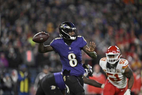 Baltimore Ravens quarterback Lamar Jackson (8) throws a pass during the second half of the AFC Championship NFL football game against the Kansas City Chiefs, in Baltimore, Sunday, Jan. 28, 2024 (AP Photo/Terrance Williams)