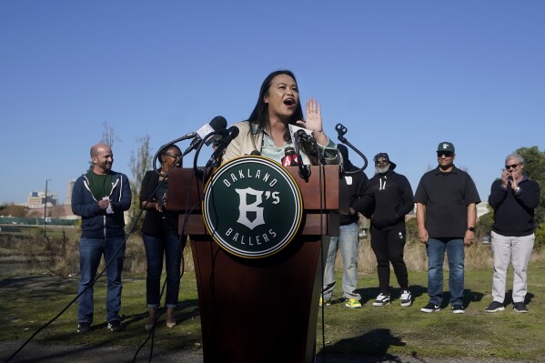 Oakland Mayor Sheng Thao speaks during a news conference at Laney College in Oakland, Calif., Tuesday, Nov. 28, 2023. A new independent league baseball team called the Oakland Ballers is set to begin play next spring and embrace the loyal A's fans who are heartbroken about their club's planned departure to Las Vegas. (AP Photo/Jeff Chiu)
