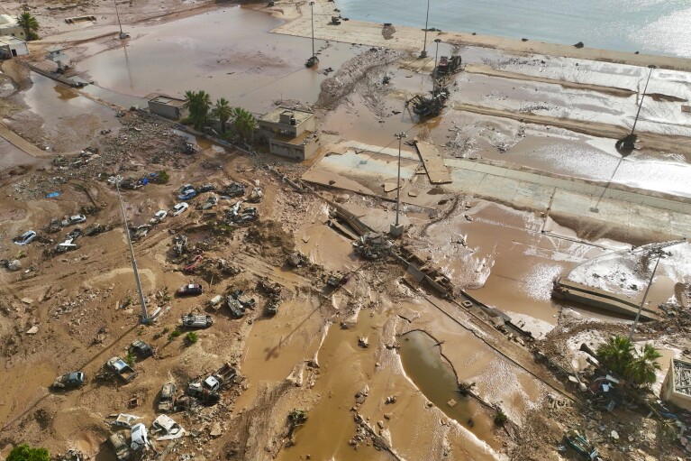 A general view of the city of Derna is seen on Tuesday, Sept. 12., 2023. Mediterranean storm Daniel caused devastating floods in Libya that broke dams and swept away entire neighborhoods in multiple coastal towns, the destruction appeared greatest in Derna city. (AP Photo/Jamal Alkomaty)