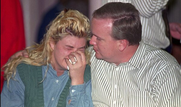 Family members wait for word about their missing relatives on April 19, 1995 at the First Christian Church in Oklahoma City, after a truck bomb exploded in the Alfred P. Murrah Federal Building. (AP Photo/J. Pat Carter, File)