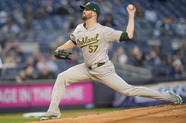 Oakland Athletics pitcher Alex Wood (57) pitches during the first inning of a baseball game against the New York Yankees, Thursday, April 25, 2024, in New York. (AP Photo/Bryan Woolston)