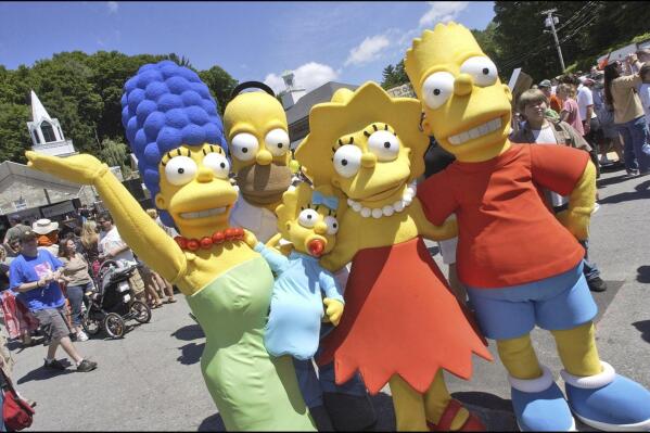 Characters from The Simpsons pose before the premiere of "The Simpsons Movie", Springfield, Vermont, July 21, 2007. Walt Disney Co. has been recently removed an episode from cartoon series The Simpsons that included a reference to “forced labor camps” in China from its streaming service in Hong Kong. (AP Photo)
