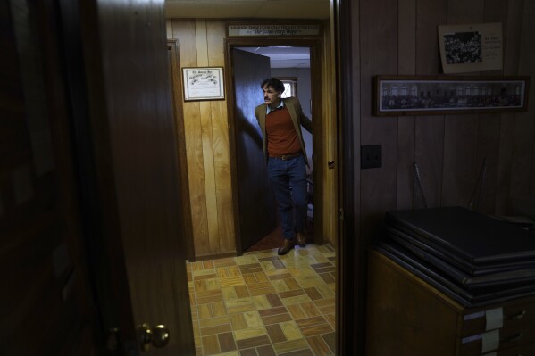 Nathan Rees, a committee member and Sacred Harp museum curator, at The Sacred Harp Publishing Company and Museum in Carrolton, Ga., on Friday, March 21, 2025. (AP Photo/Jessie Wardarski)