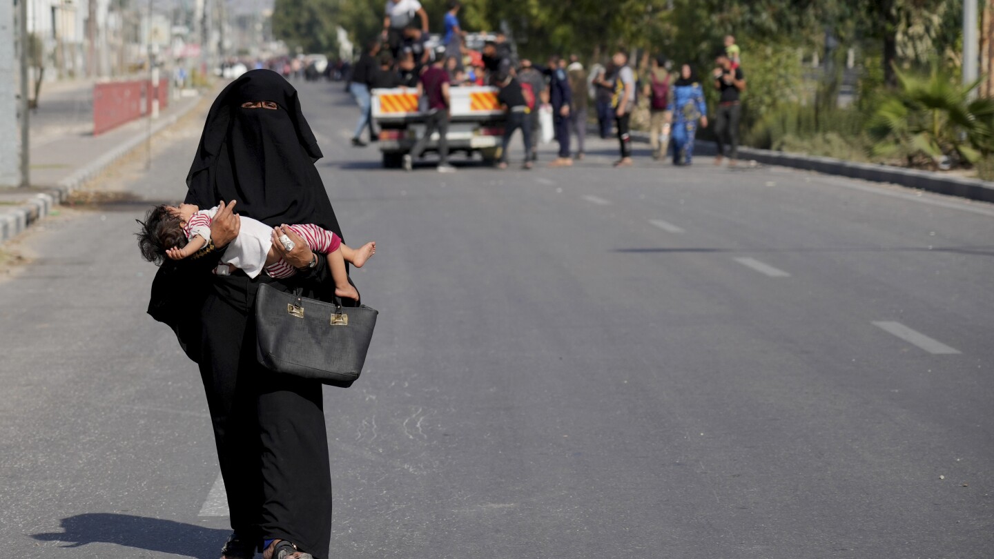 Civilians fleeing northern Gaza’s combat zone report a terrifying journey on foot past Israeli tanks