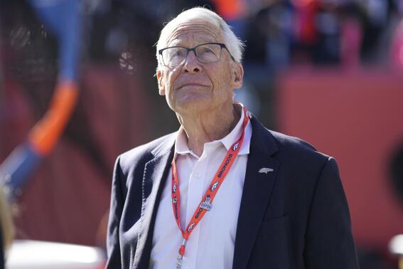 FILE - Denver Broncos owner Rob Walton waits for the team's NFL football game against the Las Vegas Raiders in Denver on Nov. 20, 2022. Inflation is not going to hurt the bankrolls of sports team owners. In fact, it may help. While the uber-rich will have to pay a little more for their eggs at the grocery store – just like everyone else – inflation is not likely to affect the bottom lines at their sports properties, whether it is yearly revenues or when it comes time to sell. (AP Photo/Jack Dempsey, File)