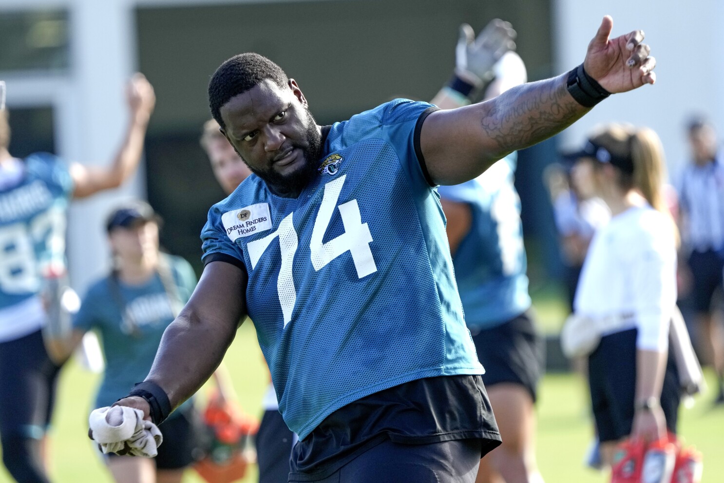 Jaguars LT Cam Robinson embraces temporary backup role while preparing for  4-game suspension | AP News