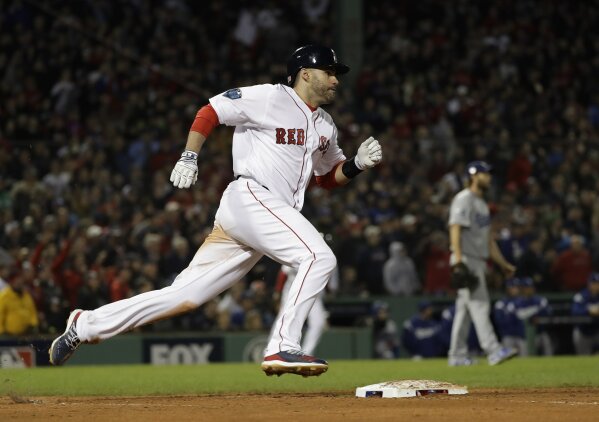 The Latest: Red Sox come out swinging, beat Dodgers 8-4