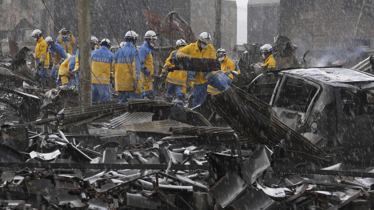 Japan earthquakes: Death toll reaches 100 as survivors are found in smashed homes
