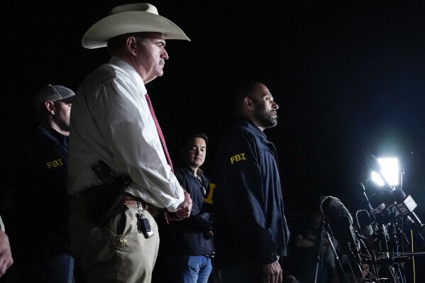 FILE - San Jacinto County Sheriff Greg Capers, left, and FBI assistant Special Agent in Charge Jimmy Paul speak to the media during a news conference announcing the arrest of murder suspect Francisco Oropeza on Tuesday, May 2, 2023 in Cleveland, Texas. Law enforcement officials captured Oropeza on Tuesday night at a home near Houston, ending a four-day manhunt for a suspect who police believe fled after a mass shooting that left five dead. (Brett Coomer/Houston Chronicle via AP, File)
