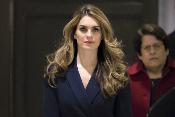 
              In this Feb. 27 2018 photo, White House Communications Director Hope Hicks, one of President Trump's closest aides and advisers, arrives to meet behind closed doors with the House Intelligence Committee, at the Capitol in Washington. Hicks, one of President Donald Trump's most loyal aides, is resigning. In a statement, the president praises Hicks for her work over the last three years. He says he "will miss having her by my side."  The news comes a day after Hicks was interviewed for nine hours by the panel investigating Russia interference in the 2016 election and contact between Trump's campaign and Russia.  (AP Photo/J. Scott Applewhite)
            
