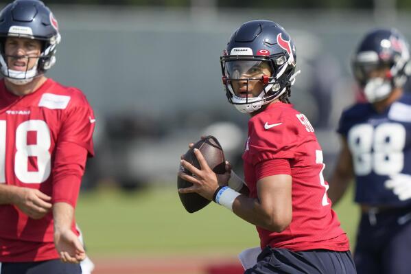 Houston Texans quarterback C.J. Stroud (7) throws a pass during an organized team activity at the football team's training facility Tuesday, May 23, 2023, in Houston. (AP Photo/David J. Phillip)