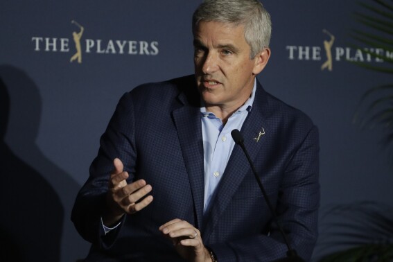 FILE - PGA Tour Commission Jay Monahan speaks during a news conference Friday, March 13, 2020, in Ponte Vedra Beach, Fla. Back to full health, Monahan said Wednesday, Aug. 9, 2023, the PGA Tour is on the right path to finalize a deal with the Saudi backers of LIV Golf and that whether he's the best person to lead the tour will depend on the results. Monahan spoke publicly for the first time since he returned to work July 17, having stepped away for three weeks with what he described as anxiety that had been building up over time. (AP Photo/Chris O'Meara, File)