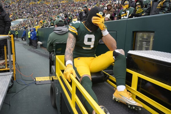 Packers' Christian Watson out for season with torn ACL in right knee | AP News
