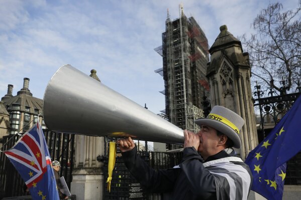 Anti Brexit campaigner Steve Bray demonstrates outside Parliament in London, Wednesday, Jan. 15, 2020. Britain is due to leave the European Union on Jan. 31. (AP Photo/Kirsty Wigglesworth)