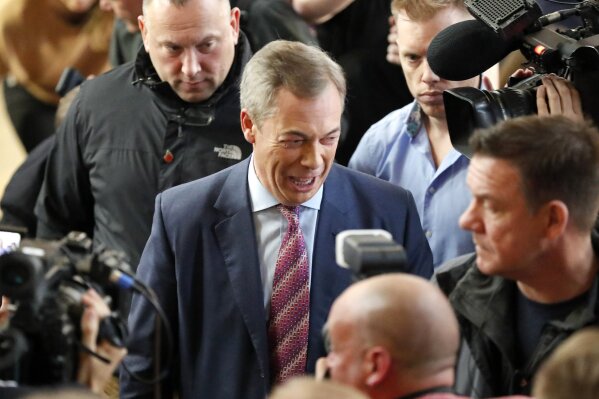 Brexit party leader Nigel Farage speaks to journalists during an event as part of the General Election campaign trail, in Hartlepool, England, Monday, Nov. 11, 2019. Britain goes to the polls on Dec. 12. (AP Photo/Frank Augstein)