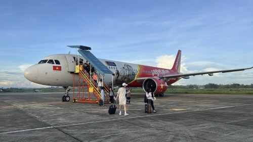 In this photo provided by the Civil Aviation Authority of the Philippines Laoag, passengers disembark from a Vietjet Airbus A321 at the Laoag international airport in Ilocos Norte province, northern Philippines on Wednesday June 28, 2023. The Vietjet plane carrying more than 200 people made an unscheduled but safe landing in the northern Philippines on Wednesday morning after encountering an unspecified technical problem. None of the passengers and crew was hurt. (Civil Aviation Authority of the Philippines Laoag via AP)