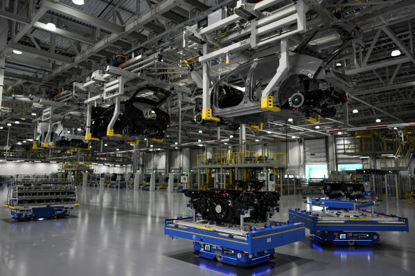 Robotic apparatus moves on the floor during a media tour at the Hyundai Motor Group Metaplant America, Wednesday, March 26, 2025, in Ellabell, Ga. (AP Photo/Mike Stewart)