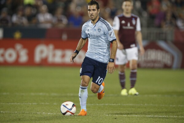 In this Aug. 29, 2015 photo shows Sporting KC midfielder Benny Feilhaber (10) dribbles in the second half of an MLS soccer match in Commerce City, Colo. (AP Photo/David Zalubowski, File)
