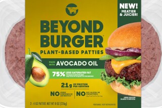 This image provided by Beyond Meat shows packaging for the latest iteration of the plant-based Beyond Burger. Beyond Meat, which has been struggling with falling U.S. demand, reformulated its burger to contain less fat and more protein. (Beyond Meat, Inc. via AP)