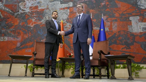 Montenegro's President Jakov Milatovic, left, shakes hands with his Serbian counterpart Aleksandar Vucic at the Serbia Palace in Belgrade, Serbia, Monday, July 10, 2023. Milatovic is on a two-day official visit to Serbia. (AP Photo/Darko Vojinovic)