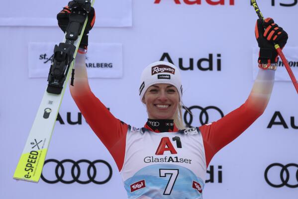 The winner Switzerland's Lara Gut Behrami celebrates after completing an alpine ski, women's World Cup super-G, in St. Anton, Austria, Sunday, Jan.15, 2023. (AP Photo/Marco Trovati)