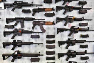 
              FILE - In this July 20, 2014 file photo, guns are displayed for sale by an arms seller east of Colorado Springs, Colo. The U.S. is among wealthy countries where suicides by gun outnumber gun killings, according to a study of 1990-2016 data, released on Tuesday, Aug. 28, 2018. (AP Photo/Brennan Linsley, File)
            