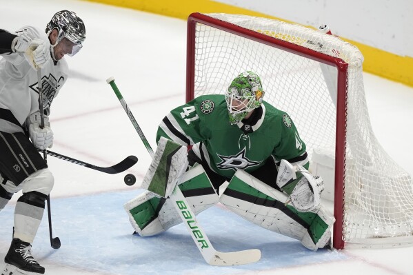 Dallas Stars goaltender Scott Wedgewood (41) defends the goal against Los Angeles Kings center Anze Kopitar during the first period an NHL hockey game in Dallas, Saturday, March 16, 2024. (AP Photo/LM Otero)
