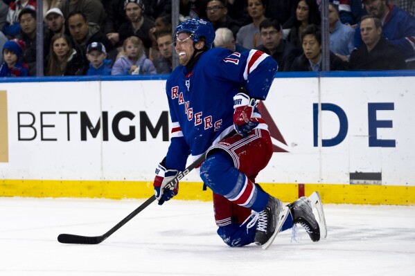 New York Rangers right wing Blake Wheeler (17) reacts while trying to stand in the first period of an NHL hockey game against the Montreal Canadiens, Thursday, Feb. 15, 2024, in New York. (AP Photo/Peter K. Afriyie)