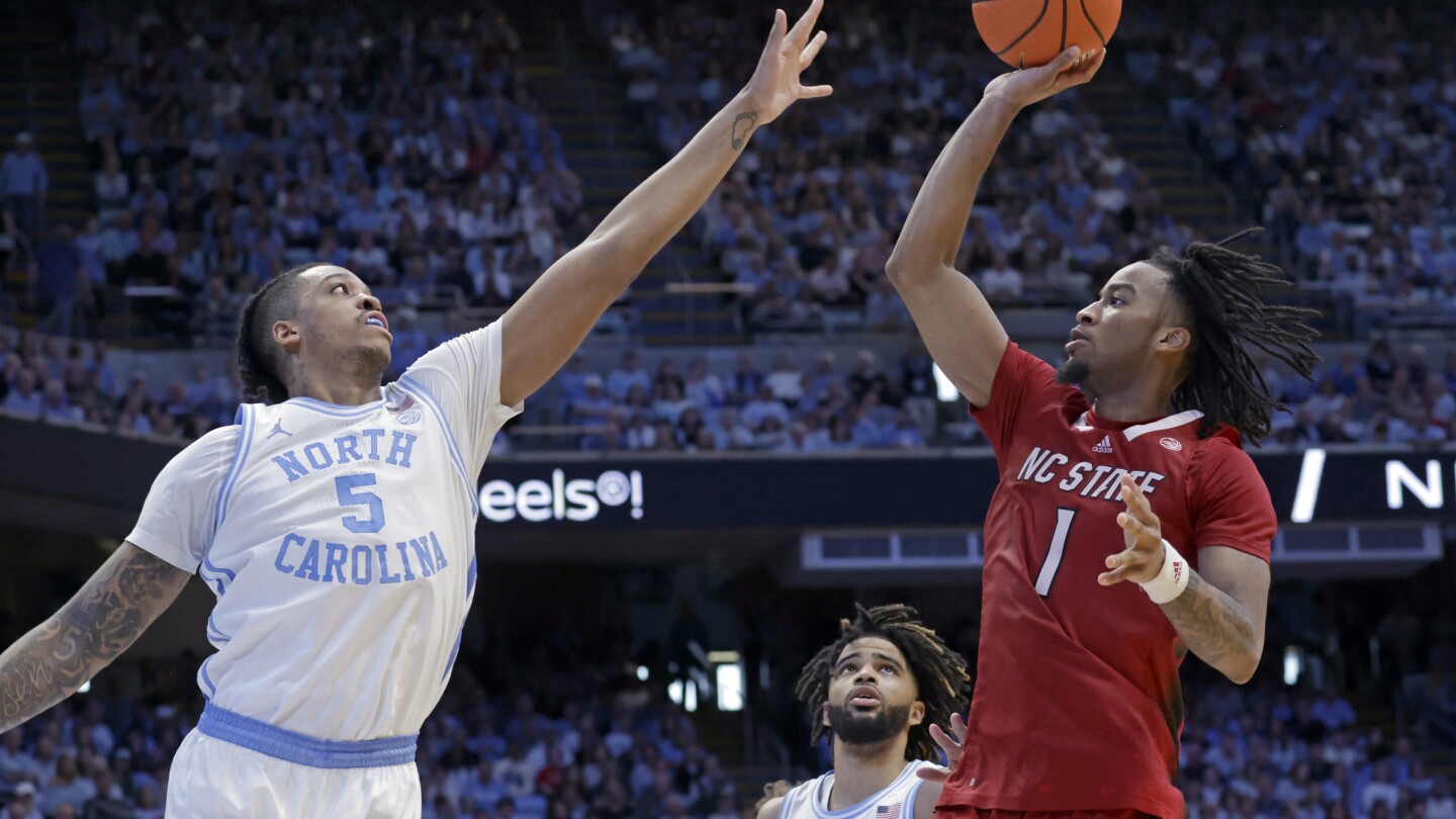 No. 9 North Carolina beats NC State 79-70, maintains hold on first place in ACC No. 9 North Carolina beats NC State 79-70, maintains hold on first place in ACC