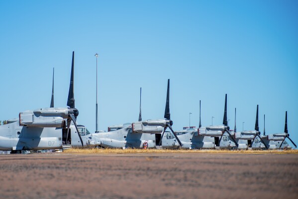 In this photo released by Australian Department of Defense, United States Marine Corps MV-22B Osprey tiltrotor aircraft are parked at RAAF Base Darwin, Australia, Aug. 11, 2023, during Exercise Alon at the Indo-Pacific Endeavour 2023. Several U.S. Marines remained in a hospital in the Australian north coast city of Darwin on Monday after they were injured in a fiery crash of a tiltrotor aircraft on an island. (CPL Robert Whitmore/Australian Department of Defense via AP)