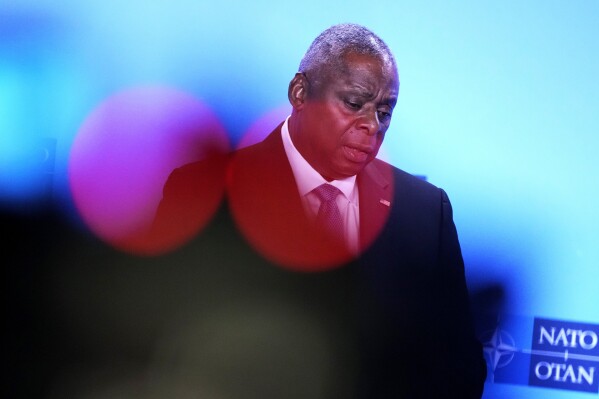 United States Secretary of Defense Lloyd Austin addresses a media conference on the sidelines of a meeting of NATO defense ministers at NATO headquarters in Brussels, Thursday, Oct. 12, 2023. (AP Photo/Virginia Mayo)