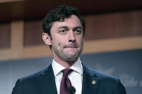 FILE - Sen. Jon Ossoff, D-Ga., takes a question from a reporter during a news conference on Capitol Hill in Washington, Sept. 28, 2021. The U.S. Senate is launching a bipartisan working group of lawmakers to scrutinize conditions within the federal Bureau of Prisons in the wake of Associated Press reporting that uncovered widespread corruption and abuse in federal prisons across the U.S. The working group is led by Sen. Jon Ossoff, a Democrat from Georgia and Sen. Mike Braun, an Indiana Republican. (AP Photo/Andrew Harnik, File)