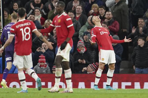 Manchester United's Cristiano Ronaldo reacts after missing a scoring chance during the English FA Cup fourth round soccer match between Manchester United and Middlesbrough at Old Trafford stadium in Manchester, England, Friday, Feb. 4, 2022. (AP Photo/Jon Super)