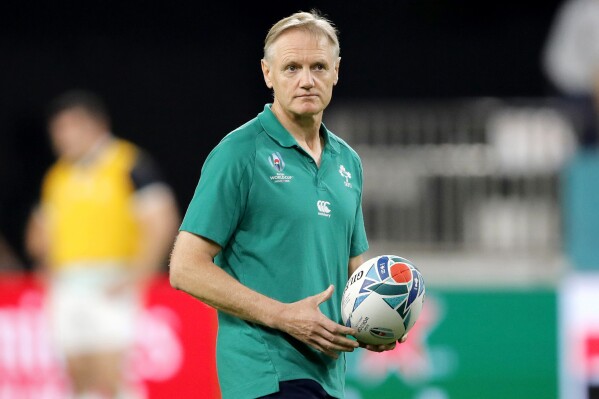 FILE - Ireland's coach Joe Schmidt watches as his players warm up ahead of the Rugby APCup Pool A game at Kobe Misaki Stadium between Ireland and Russia, in Kobe, Japan, on Oct. 3, 2019. New Zealand-born former Ireland coach Joe Schmidt has been named the new head coach of the Wallabies, succeeding Eddie Jones. Rugby Australia announced Schmidt鈥檚 appointment in a statement Friday, Jan. 19, 2024. (APPhoto/Christophe Ena, File)