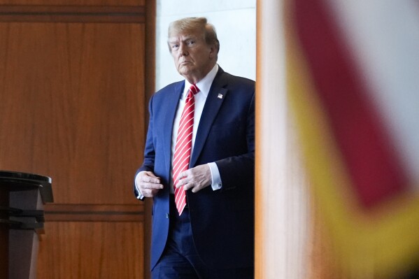 Republican presidential candidate former President Donald Trump arrives to speak after meeting with members of the International Brotherhood of Teamsters at their headquarters in Washington, Wednesday, Jan. 31, 2024. (AP Photo/Andrew Harnik)