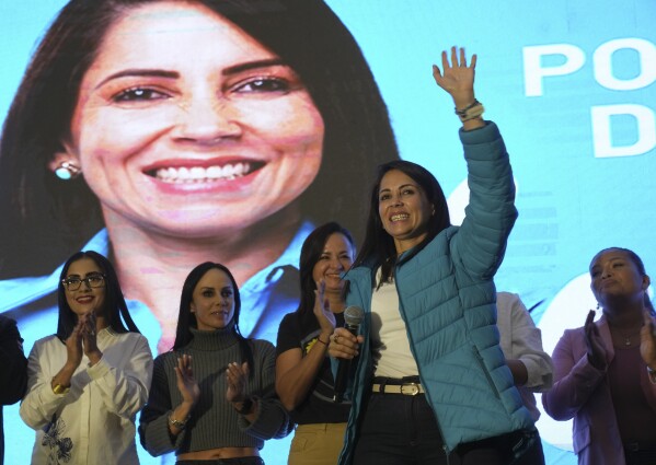 Candidate Luisa González waves to her supporters after conceding the presidential race to her opponent Daniel Noboa, as she speaks from the Hilton Hotel in Quito, Ecuador, Sunday, Oct. 15, 2023. (AP Photo/Dolores Ochoa)
