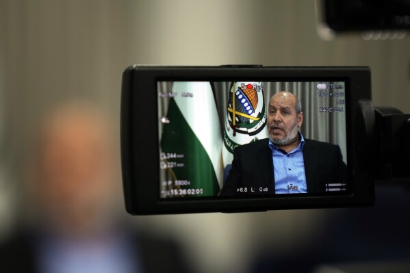 Khalil al-Hayya, a high-ranking Hamas official who has represented the Palestinian militant group in negotiations for a cease-fire and hostage exchange deal, speaks during an interview with The Associated Press, in Istanbul, Turkey, Wednesday, April 24, 2024. (AP Photo/Khalil Hamra)