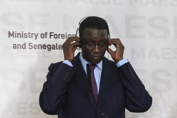 FILE - Senegal's Foreign Affairs minister Amadou Ba attends a press conference at the Presidential Palace, in Dakar, Senegal, Sunday, Feb. 16, 2020. Senegal’s top decision-making body has published the final list of candidates for next month’s presidential election, excluding two of the West African nation’s top opposition leaders. The list published by Senegal’s Constitutional Council on Saturday, Jan. 20, 2024 named 20 candidates for the election, including Prime Minister Amadou Ba, who has been backed by outgoing President Macky Sall. (Andrew Carballero-Reynolds/Pool Photo via AP, file)