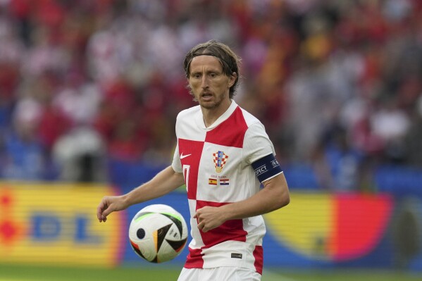 Croatia's Luka Modric controls the ball during a Group B match between Spain and Croatia at the Euro 2024 soccer tournament in Berlin, Germany, Saturday, June 15, 2024. (AP Photo/Sunday Alamba)