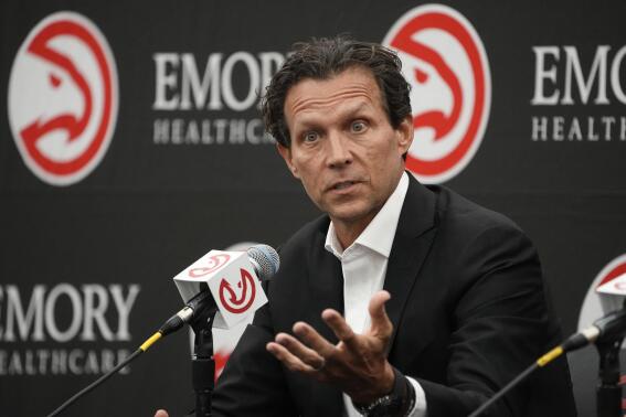 Newly hired Atlanta Hawks NBA basketball coach Quin Snyder speaks during a news conference Monday, Feb. 27, 2023, in Atlanta. AP Photo/John Bazemore)