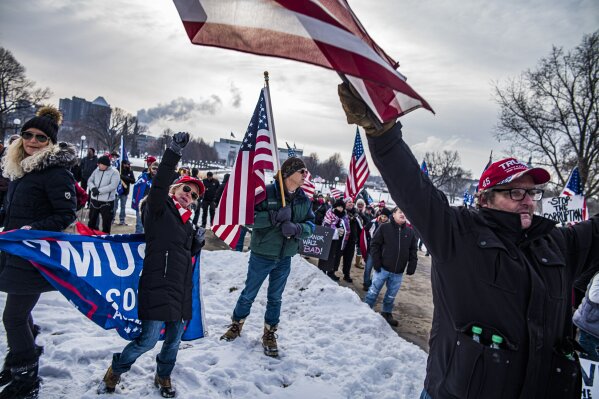 Protesters attend a rally in support of President Donald Trump on Wednesday, Jan. 6, 2021 in St. Paul, Minn.   (Richard Tsong-Taatarii/Star Tribune via AP)