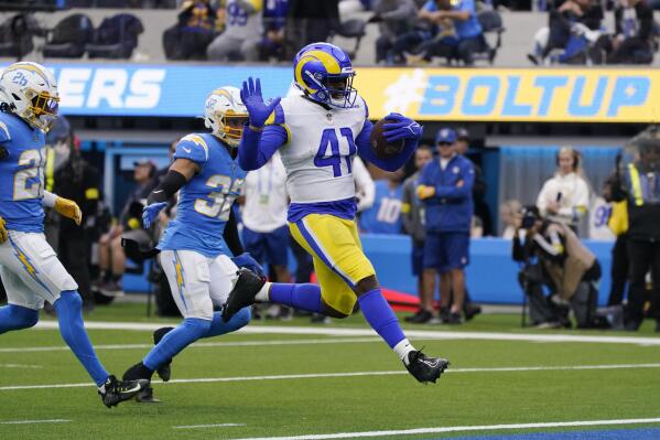 Los Angeles Rams running back Malcolm Brown scores a touchdown during the first half of an NFL football game against the Los Angeles Chargers Sunday, Jan. 1, 2023, in Inglewood, Calif. (AP Photo/Mark J. Terrill)